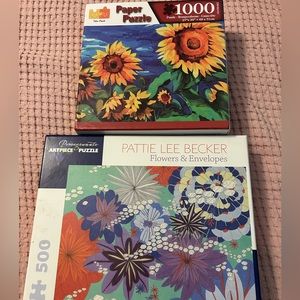 2 puzzles - one brand new in package!